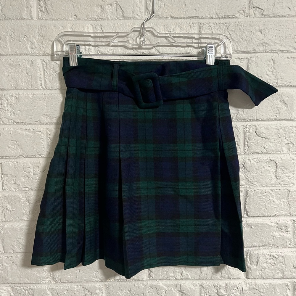 Pleated plaid mini skirt